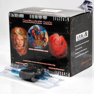 May include: A black box with the words "Infiniti Ink" and a website address printed on it. The box contains two tattoo needles in clear plastic packaging. The needles are individually blister packed.