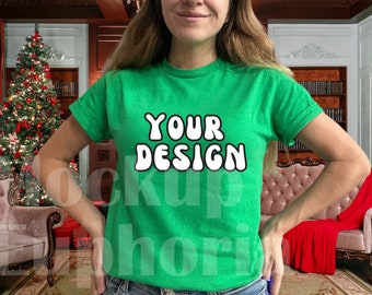 May include: A woman wearing a green t-shirt with the text "YOUR DESIGN" in white. The shirt is a blank canvas for customisation.