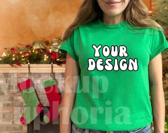 May include: A woman wearing a bright green t-shirt with the text "YOUR DESIGN" in white. The shirt is a crew neck style with short sleeves.