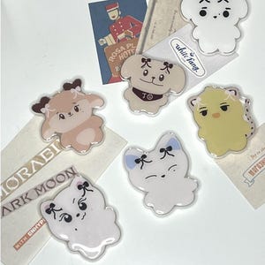 Enhypen character phone grips