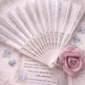 Decorative lace fan and romantic message card styled with rose soap, elegant Regency inspired spa gift set detail.