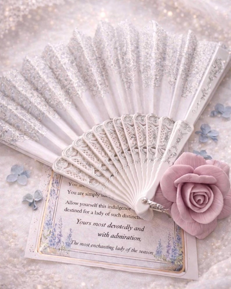 Decorative lace fan and romantic message card styled with rose soap, elegant Regency inspired spa gift set detail.