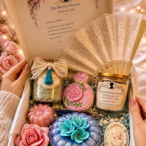 Luxury Regency spa gift box held in hands, romantic vintage self care gift set with bath bombs, candle and soap