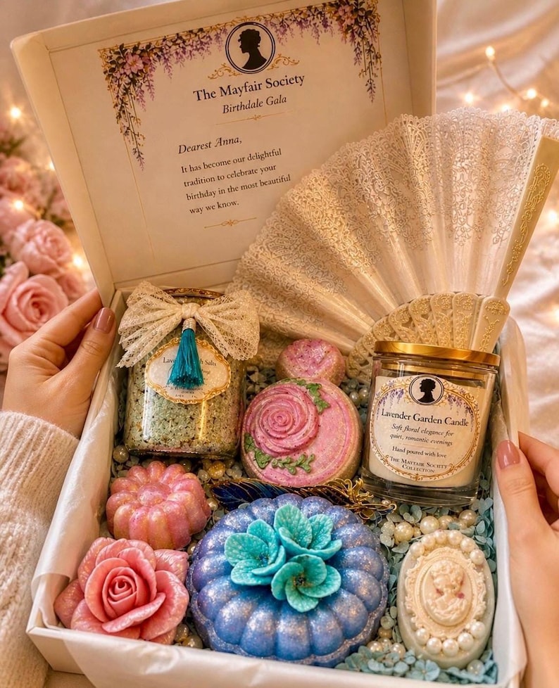 Luxury Regency spa gift box held in hands, romantic vintage self care gift set with bath bombs, candle and soap