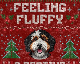 May include: A red, festive-themed blanket with the words "FEELING FLUFFY & FESTIVE" in white. The design includes a dog's face, Christmas trees, and snowflake and berry accents. The blanket has a textured appearance.