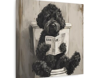 May include: A black dog sits on a white toilet, reading a newspaper with the word "BAIN" on the front. The dog is wearing a serious expression and has a fluffy, curly coat.