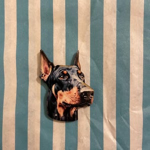 Doberman dog brooch.