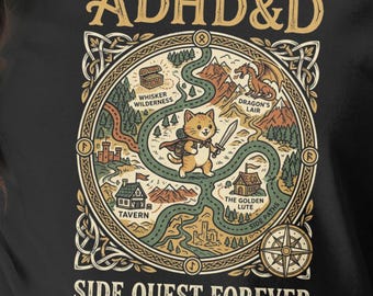 May include: A black short-sleeve t-shirt featuring a circular fantasy map graphic with the text ADHD&D at the top and SIDE QUEST FOREVER at the bottom. The illustration depicts a central cat character with a sword, surrounded by paths.
