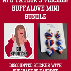 May include: A sticker featuring a cartoon illustration of a woman with thumbs up, wearing a red shirt and white sweater, with the text "GO SPORTS!" and a pair of red, white, and blue heart-shaped earrings with gold hooks. The earrings are labeled "SUMMER SISTERS".