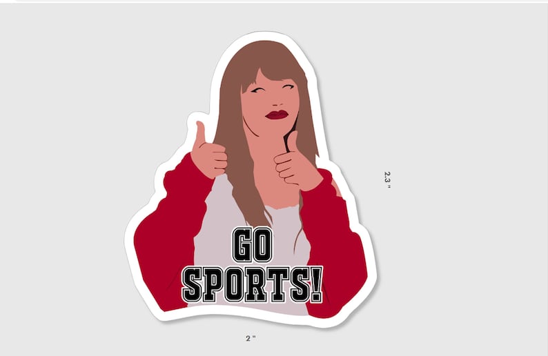 May include: A sticker featuring a cartoon woman with brown hair and red lipstick giving a thumbs up with both hands. The sticker has the text "GO SPORTS!" in black letters on a white background.