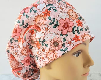 Regenboog wolk scrubmuts zon, zomer scrubmuts, operatiemuts regenboog bloemen, scrubmuts boho regenboog