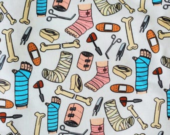 May include: A white background with a repeating pattern of medical supplies and broken bones. The pattern includes bandages, casts, crutches, bone fragments, and medical tools. The pattern is in shades of blue, pink, yellow, and brown.