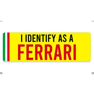 May include: Yellow sign with green, white, and red stripes on the left side. The sign says "I identify as a FERRARI" in black and red letters.