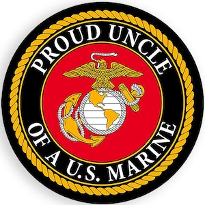 May include: A black and gold round emblem with the words "Proud Uncle of a U.S. Marine" surrounding a red background with the Marine Corps emblem. The emblem features a globe, an eagle, and an anchor.