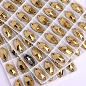 Navettes de cristal de vidrio para coser en oro metálico 3223 de 7 x 15 mm, 9 x 18 mm, diamantes de imitación con parte trasera plana Dorado Aurum Premium K9, piedras preciosas de vidrio Marquis