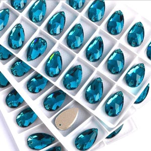 スワロフスキー4728番、10x7mmと16x12mmのハーフラウンドファセット