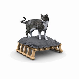 May include: A gray and white tabby cat standing on a gray and white striped cushion on a wooden cat bed.