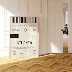 May include: A printable boarding pass for a flight to Atlanta, Georgia. The pass is in black and white with a pink stripe on the side. It says "BOARDING PASS", "ONE WAY", "ATL", "FIRST CLASS", "ATLANTA", "GATE A22", "TIME 01:11 EST", and "SEAT 1B".