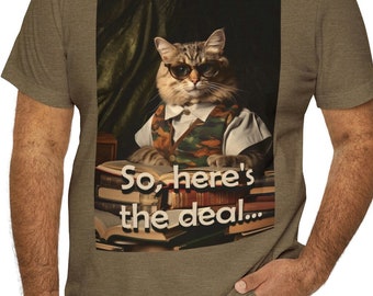 May include: A brown t-shirt with a graphic of a cat wearing sunglasses and a vest, sitting on a stack of books. The text "So, here's the deal..." is printed below the cat.