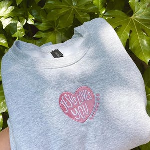 Embroidered Jesus Loves You Crewneck Sweatshirt: Christian Apparel