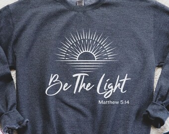 Felpa con cappuccio Be The Light, girocollo con versetto della Bibbia cristiana
