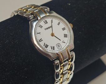 Vintage Tissot Schweizer Quarz Damenuhr F218 Saphirkristall Zweifarbiges römisches Zifferblatt Datum 25 mm