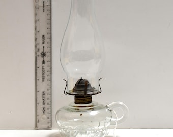 Antique Clear Glass Finger Oil Lamp – Late Petal Base, Flat Finger Loop, 1909