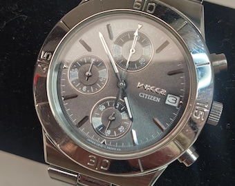 Reloj cronógrafo Citizen Wicca vintage de acero, fabricado en Japón con cuarzo, década de 2000.