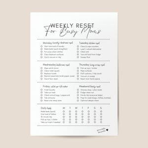 May include: A white paper checklist titled Weekly Reset For Busy Moms with black text. It features daily household tasks organized by day of the week from Monday to Sunday, including checkboxes for tracking progress and a small heart icon at the bottom.
