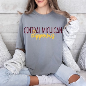 May include: A gray t-shirt with the text "CENTRAL MICHIGAN Chippewas" in maroon and gold lettering.