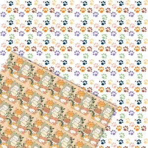 May include: A seamless pattern featuring a repeating design of colorful paw prints on a white background. The pattern is overlaid with a second pattern of cartoon cats and flowers on a light brown background.