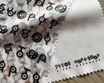 Paño de microfibra para limpiar lentes de gafas de Pokémon Unown