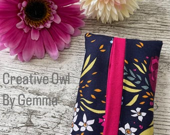 May include: A navy blue tissue box cover with a floral pattern in yellow, orange, and white. The cover has a pink fabric trim on the side. The text "Creative Owl By Gemma" is visible in the image.