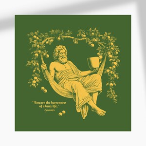 May include: A green background with a yellow illustration of a man sitting in a hammock with a cup in his hand. The man has a beard and is wearing a toga. The hammock is surrounded by a tree with yellow apples. The text "Beware the barrenness of a busy life." - Socrates is below the hammock.
