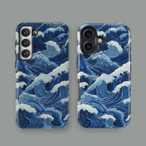 May include: Two phone cases with a repeating pattern of stylized ocean waves in shades of blue and white. The cases are designed to fit different phone models, with camera cutouts visible.