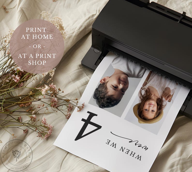 May include: A black printer printing a photo of two children. The photo is labeled "WHEN WE were 4". The image also includes the text "PRINT AT HOME - OR - AT A PRINT SHOP". Dried flowers and a logo are in the foreground.