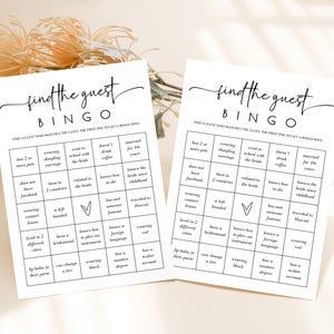 May include: Two white bingo cards with black text that reads "find the guest BINGO". The cards have a grid of clues to match guests. The cards are for a bridal shower game.
