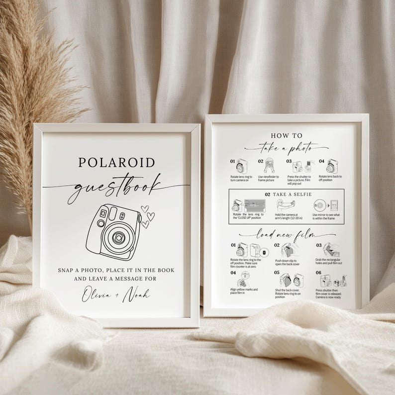 May include: Two white framed signs with black text and line art. The left sign reads Polaroid guestbook, includes a camera illustration, and the names Olivia + Noah. The right sign provides instructions on how to take a photo and load new film.
