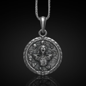 Collar con colgante de mujer gritando y calaveras en plata de ley oxidada
