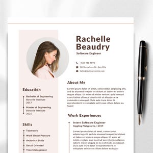 May include: A white ceramic mug with a black handle and the text "But First, Coffee" in a black, handwritten-style font. The mug is on a white surface.