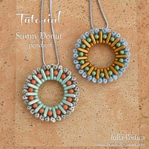 May include: Two beaded pendant necklaces with a donut design. One pendant features a silver-coloured base with turquoise, coral, and silver beads. The other has a gold-coloured base with green, gold, and blue beads. The text "Tutorial Sunny Donut pendant" is visible.