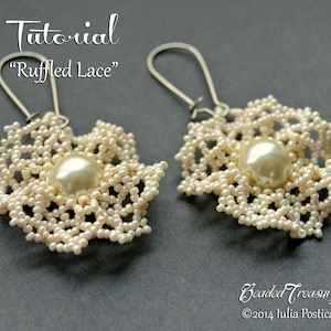 May include: A pair of cream-colored beaded earrings with a floral design. Each earring features a large, pearlescent bead at the center, surrounded by a delicate, ruffled lace pattern. The earrings have silver-colored hooks. The text "Tutorial 'Ruffled Lace'" is visible.