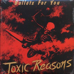 May include: A black and red album cover with a skeleton riding a plane. The album title is "Bullets For You" and the band name is "Toxic Reasons" in gold lettering.
