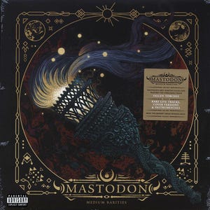 May include: A black and gold album cover with a stylized image of a torch against a dark, starry background. The album title is "Mastodon: Medium Rarities" and features the text "Fallen Torches" and "Rare Live Tracks, Cover Versions & Instrumentals from the "Crack the Skye" World Touring Band."