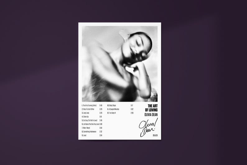 May include: Monochrome album cover for Olivia Dean's "The Art of Loving." The image shows a blurred artistic photo of a person. The album title and artist name are displayed in a modern font. A tracklist and signature are also visible.