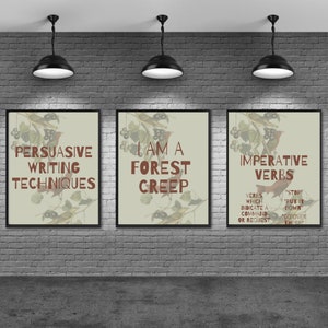 May include: Three framed posters with a nature theme. The first poster says "Persuasive Writing Techniques" with a bird illustration. The second poster says "I am a Forest Creep" with a bird illustration. The third poster says "Imperative Verbs" with a bird illustration and text about verbs that indicate a command or request.