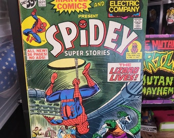 Super Stories Spidey #36 1978 Spiderman contre Lézard Bande dessinée Marvel Electric Company