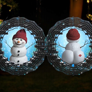 May include: A pair of metal wind spinners with a snowman design. The snowman on the left is facing forward with a happy expression, while the snowman on the right is facing away from the viewer with a red heart on its backside.