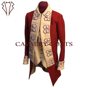 May include: A red and white military-style coat with silver buttons and white trim. The coat has a high collar and a long, flowing tail. The coat is decorated with a series of silver buttons down the front and on the sleeves. The coat is made of a thick, heavy fabric.