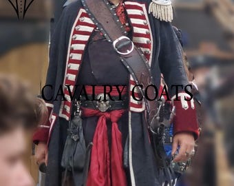 May include: A dark navy coat with red and white trim, a brown leather belt, and a red sash. The coat has epaulettes and the text "CAVALRY COATS". The outfit is reminiscent of historical military attire.